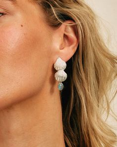 Showstopping sterling silver aquamarine shell earrings. These statement earrings will have everyone complimenting your unique style! They are perfect for the boho beach lover looking to embrace mermaid vibes or for the girl who loves unique jewelery that speaks volumes! Aquamarine can represent hope, happiness and emotions. It also connects us to the wisdom of water and the moon.Material: Genuine Sterling Silver 92.5Gemstone: AquamarineGemstone size: 8mmLength/wide: 40mmCondition: Brand new Ocean-inspired Drop Earrings For Summer, Shell-shaped Sterling Silver Jewelry For Beach, Ocean-inspired Drop Shell Earrings, Nickel-free Shell Jewelry In Ocean-inspired Style, Ocean-inspired Nickel-free Shell Jewelry, Ocean-inspired Earrings For Beach, Bohemian Silver Shell Earrings, Shell Ocean-inspired Earrings, Ocean-inspired Turquoise Shell Jewelry