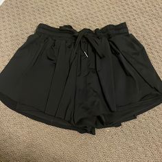 Black Flowy Butterfly Shorts Built In Shorts Never Worn Black Pants With Built-in Shorts For Summer, Black Bottoms With Pockets For Day Out, Black Short Pants With Elastic Waistband, Black Short Pants For Spring, Stretch Black Bottoms For Day Out, Black Stretch Bottoms For Day Out, Stretch Black Shorts For Day Out, Black Shorts With Elastic Waistband For Day Out, Black Stretch Shorts For Day Out