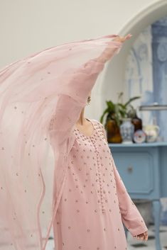 Meet our eye-catching Pale Pink pure crepe silk long shirt all hand worked with a spray of florets made with pearls, beads and sequins, a unique piece that stands out. It's versatile, comfy, and crafted with care. Perfect for making a bold yet elegant statement on any occasion. You can pair with matching pure organza dupatta handworked on the corners with resham motifs with spray of florets (Sold Separately). Silk Saree Dress, Astoria Ny, Misty Rose, Organza Dupatta, Saree Dress, Silk Pants, Long Shirt, The Outfit, Wedding Suits