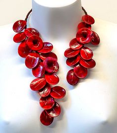 "Ornamental and wonderful Murano  glass necklace made with rigid metal and really beautiful glass red flowers and glass red leaves  made in lampworking techniques. this is very original, special, decorative and different glass necklace  the length is  12,60 inch (32 cm.).            this wonderful glass flowers necklace  is handmade according to the current fashion.  It is a necklace / sculpture suitable for important occasions and social events. ❤  Coupled earrings are also available  ❤  PERFEC Handmade Red Flower Necklace Adjustable, Handmade Red Flower Necklace With Adjustable Fit, Handmade Adjustable Red Flower Necklace, Unique Red Glass Necklace, Handmade Red Flower Necklace, Unique Red Flower Jewelry, Unique Red Flower-shaped Jewelry, Unique Red Flower Shaped Jewelry, Handmade Red Long Necklace