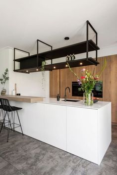 the kitchen is clean and ready to be used as a dining room or office space