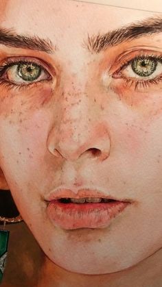 a painting of a woman with freckles on her face