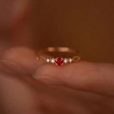 Dainty Ruby Gold Ring, July Birthstone Rings, Ruby Diamond Ring, Red Ruby Stacking Ring, Genuine Ruby Rings, Graduation Ring, Casual Rings We use the highest quality moissanite! Moissanite: ✦ Color: D Colorless ✦ Clarity: VVS1 OR All our diamonds are 100% natural. We use only conflict-free diamonds and gemstones. Diamond: ✦ Color: F-G ✦ Clarity: SI1-VS ✦PRODUCT DETAILS✦ → center stone: natural ruby → accent stone: diamonds Also available in other colored gemstones upon request. Please get in tou Elegant Red Crystal Round Ring, Elegant Red Round Crystal Ring, Elegant Red Open Ring Jewelry, Elegant Red Ruby Open Ring, Fine Jewelry Red Ruby Ring Gift, Red Ruby Ring Fine Jewelry Gift, Fine Jewelry Lab-created Ruby Promise Ring, Diamond Rings With Gemstone Accents For Promise, Red Birthstone Jewelry For Promise