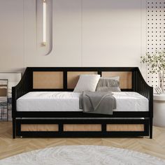 Embrace versatility and style with this twin daybed featuring a twin trundle, perfect for small spaces or accommodating guests. The elegant rattan design on the high back panel and sloped side arms adds a sophisticated flair. Built to last, it supports up to 300 lbs on both the upper bed and trundle for dependable everyday use. The included slat kit offers excellent mattress support, removing the need for bulky box springs. Recommended mattress thickness is 8-12 inches for the upper bed and up t Wooden Daybed, Twin Daybed With Trundle, Twin Daybed, Twin Trundle, Rattan Design, Box Springs, Daybed With Trundle, Mattress Support, Trundle Bed