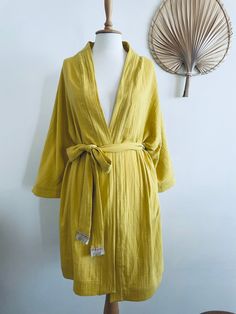 UltraSoft stylish kimono cardigan made of 100 % muslin cotton ( 2 layer ) will make you feel as in cocoon of coziness. This handmade clothing is a gorgeous gift for your loved ones. Lightweigh&Fastdrying kimono perfect summer clothing :) Different colors available soon !  Sizes : - S/M - L Colors: - corn yellow Care instructions:  - delicate machine wash with mild soap  - do Not Tumble Dry  - do not use bleachers Back to shop: https://www.etsy.com/shop/CottonMood?ref=hdr_shop_menu Stylish Kimono, Yellow Kimono, Kimono Beach, Mode Kimono, Cardigan Kimono, Summer Kimono, Beach Clothing, Summer Blanket, Handmade Clothing