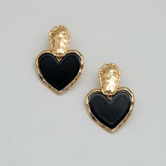 Discover Timeless Elegance Introducing our latest collection piece, the Black Heart Drop Earrings, a perfect blend of vintage charm and contemporary fashion. These earrings feature a classic heart shape, embodying love and elegance in every detail. Crafted from durable zinc alloy, they boast a glossy black finish that adds a touch of sophistication to any outfit. Ideal for women who adore fashion-forward accessories, these earrings are sure to make a statement at any event. Product Features Our Chic Metal Heart Earrings For Pierced Ears, Black Double Heart Jewelry For Party, Trendy Black Double Heart Jewelry, Vintage Black Jewelry For Valentine's Day, Black Heart Charm Earrings As Gift, Black Earrings With Heart Charm For Gift, Trendy Black Heart Earrings For Gift, Black Vintage Jewelry For Valentine's Day, Black Heart Drop Earrings For Party