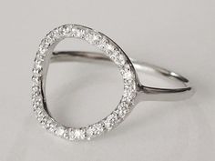 Modern Open Circle Jewelry With Ring Detail, Chic Silver Rings For Everyday Wear, Modern Halo Diamond Ring With Round Band, Chic Everyday Silver Rings, Minimalist Cubic Zirconia Crystal Ring, Modern Silver Diamond Ring For Everyday, Modern Silver Diamond Ring With Halo, Modern Diamond Ring With Halo Design, Modern Silver Halo Diamond Ring