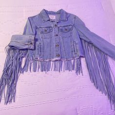 Womens Medium Cropped Fringe Jean Jacket Brand New Without Tags, Perfect Condition No Flaws. Please Refer To Photos For Condition. I Bought This From A Local Boutique And I Never Wear It!! Nature Denim Los Angeles Smoke Free Home Pet Friendly Home Please Let Me Know If You Have Any Questions Or Concerns, And As Always Thank You For Looking!! Fitted Winter Outerwear With Frayed Hem, Fitted Denim Blue Outerwear With Frayed Hem, Trendy Fitted Outerwear With Frayed Hem, Fitted Trendy Outerwear With Frayed Hem, Spring Denim Jacket With Fringe, Spring Blue Denim Jacket With Fringe, Fall Denim Outerwear With Fringe, Blue Denim Jacket With Fringe, Blue Outerwear With Frayed Hem For Fall