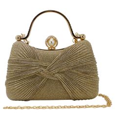 This stunning bow Shimmering clutch bag is the perfect accessory for a night out or any special occasions. The shimmering texture detailing is sure to catch the eye and add a touch of glamour to your outfit. The compact size is perfect for carrying just the essentials, and the clutch comes with a detachable metal chain strap for versatility. The bag features gold hardware, the clap is diamante rhinestone encrusted with a pearl on the inside. The two diamante encrusted grab handles lets you use it as a grab bag.  This sparkly bag is the perfect accessory for a wedding or party outfit. The glitter shades compliment party outfits. Pair with some matching sparkly shoes to stand out from the crowd. Dimension: W x H x D = 19cm x 12cm x 7cm approximately.      Perfect as a gift or present or just Wedding Clutch Bag, Sparkly Bag, Expensive Bag, Bow Clutch, Glitter Clutch, Clutch Bag Wedding, Sparkly Shoes, Gold Clutch, Wedding Clutch