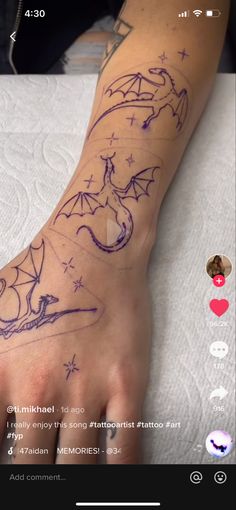 a person with a tattoo on their arm and hand is shown in an instagramtion