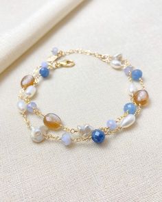 Gold Layered Blue Gemstone and Pearl Bracelet - Marshcreekjewelry Adjustable Blue Pearl Bracelet With Gemstone, Elegant Blue Multi-strand Bracelets, Blue Pearl Bracelets For Jewelry Making, Adjustable Blue Pearl Bracelet With Natural Stones, Elegant Double Strand Natural Stones Bracelets, Blue Pearl Bracelet With Natural Round Beads, Blue Pearl Bracelet With Natural Stones, Blue Multi-strand Gemstone Beads Bracelets, Blue Multi-strand Bracelets With Gemstone Beads