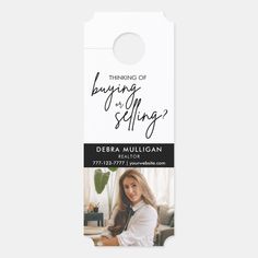 a white door hanger with the words thinking of buying for selling? on it