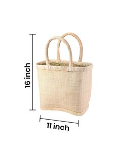 This tote bag with a hard, constructed design is made of raffia exterior, a material of natural origin imbued with a summery mood and lined with woven straw on the inside for added strength and stability. Natural lining on the top and bottom enhances the accessory. Keep your sunglasses, SPF, and essentials beach-ready stylishly stored in this sturdy boho tote. Ideal for Saturdays at the farmer’s market, seaside picnics, running errands, and many more. Gift this raffia tote bag to your fashionabl Eco-friendly Rectangular Natural Shoulder Bag, Rectangular Beach Bag With Bamboo Handle, Eco-friendly Jute Bucket Bag With Bamboo Handle, Beige Rectangular Beach Bag With Bamboo Handle, Natural Rectangular Beach Bag With Leather Handles, Eco-friendly Beige Beach Bag With Bamboo Handle, Eco-friendly Beach Bag With Bamboo Handle For Shopping, Large Natural Shoulder Bag With Braided Handles, Rectangular Natural Crochet Bag With Bamboo Handle