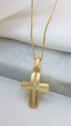 A handmade 14k Diamond Gold Cross  with total Diamonds 0.24ct A solid gold cross with a matte finish and rounded edges. an elegant gold cross ideal as the first jewelry for a baby girls as a baptismal cross and for any other circumstance like wedding - engagement - graduation Details: Height:  30mm Width:17mm Weight:Approximately  5,9gr 14k - 6.5gr 18k Metal:14k or 18k Yellow Gold  Style:Baptism Cross - Bridal Jewelry  ❣️ For more  crosses take a look here      👉  https://www.etsy.com/shop/Gior Diamond Cross Pendant Necklace For Wedding, Wedding Diamond Necklace With Cross Pendant, Diamond Cross Necklace For Wedding, Gold Diamond Necklace With Cross Pendant, Diamond White Cross Pendant Necklace For Wedding, Gold Diamond Cross Pendant Necklace For Wedding, Wedding Diamond Cross Pendant Necklace, Brilliant Cut Cross Jewelry For Wedding, Gold Cross Necklace With Diamond Accents For Anniversary