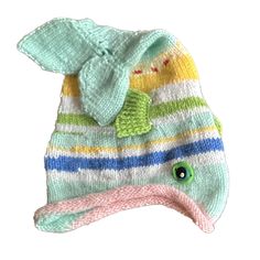 a knitted hat with an elephant on the front and green, yellow, blue, pink