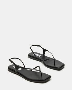 RELAXED + MINIMALIST + MODERN  The thong strap of the TOBI flat square toe  sandal  wraps around the outside of the foot to meet with the slingback strap in a unique hybrid look.  Flat square toe thong slingback sandal Slingback strap with buckle closure .75 inch heel height Leather upper material Synthetic lining Synthetic sock Synthetic sole Imported Toe Thong Sandals, Strappy Sandals Flat, Square Toe Sandals, Slingback Flats, Sandals Flat, Slingback Sandal, Minimalist Modern, Thong Sandals, Strappy Sandals