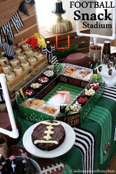 a football snack stadium table with cupcakes and snacks