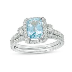 This 1/2 ct. t.w. diamond frame bridal set in 14K white gold features an 8.0 x 6.0mm cushion-cut aquamarine center stone engagement ring. Additional diamonds line the ring's shank and coordinating wedding band. Cushion Cut Topaz Ring With Diamond Accents, Light Blue Diamond Jewelry With Accent Stones, Light Blue Halo Wedding Jewelry, Fine Jewelry Diamond Bridal Sets With Accent Stones, Light Blue Diamond Wedding Jewelry, Light Blue Diamond Accented Jewelry For Anniversary, Light Blue Jewelry With Diamond Accents For Wedding, Light Blue Halo Setting Fine Jewelry, White Gold Aquamarine Jewelry With Halo Setting