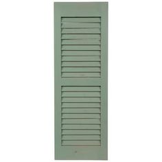 a green shuttered door on a white background