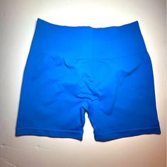 Aurola Shorts Size Medium New Never Worn Color Blue Blue Athleisure Bottoms With Built-in Shorts, Blue Athletic Shorts With Built-in Shorts For Spring, Blue Athletic Shorts With Elastic Waistband For Vacation, Blue High Waist Biker Shorts With Built-in Shorts, Blue Stretch Beach Shorts, Stretch Blue Beach Shorts, Blue Summer Shorts With Elastic Waistband, Blue Stretch Shorts For Summer, Blue Biker Shorts With Elastic Waistband