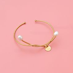 Style: Female Material: Titanium Steel, Imitation Pearl Pearl Type: Uncultured Pearl Color: White Pearl Shape: Irregular Bangle Color: Gold Bangle Perimeter: 16cm Adjustable Alloy Bangle Bracelet, Minimalist Alloy Bangle Bracelets, Minimalist Alloy Bangle Bracelet, Adjustable Metal Pearl Bracelet, Adjustable Modern Pearl Bracelet For Gift, Adjustable Modern Pearl Bracelet As Gift, Elegant Nickel-free Alloy Bracelets, Trendy Pearl Bangle Bracelet Gift, Minimalist Metal Pearl Bracelet