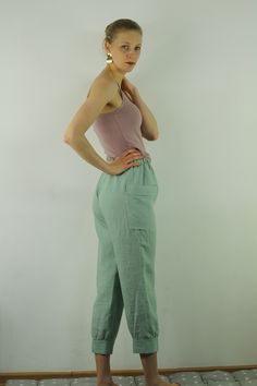 "Write the selected color in the message Women linen pants with 2 pockets in minty green color, perfect for casual wear and suitable for any occasion in any season Details: - 100% natural linen produced in Europe ; - medium weight (180 gram per square meter); - color: grayish blue, can be any from our colors catalogue (color samples at the photo); Made to order, approximately a few days, If you have any questions please message me and I will be glad to answer. Size guide : Size XS Bust: fits bus Green Straight Leg Loungewear Bottoms, Green Straight Leg Bottoms For Loungewear, Green Wide Leg Pants With Pockets, Green Wide Leg Pants With Side Pockets, Green Bottoms For Loungewear With Loosely Fitted Hips, Green Straight Pants With Hip Pockets, Green Tapered Leg Sweatpants With Elastic Waistband, Green Relaxed Fit Pants With Side Pockets, Green Cargo Pants For Loungewear