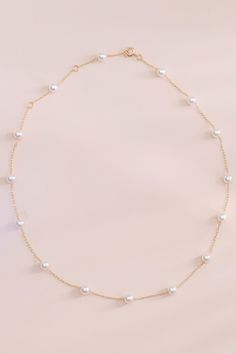 Timeless and trendy collide with our Brighton pearl necklace. It's just perfect for a Regency-inspired wedding or a cottagecore bridal shower. Wear this sweet, understated accessory with a bridesmaid's dress, a holiday sweater, or anything in between. It makes a great gift or a treat for yourself. | Jewelry | Birdy Grey Bowery Pearl Necklace Hoco Necklaces, Gold Necklace Pearl, Wedding Jewelry Pearl, Briolette Pearl Necklace, Pearl Necklace Wedding Dress, Pearl Gold Jewellery, Hoco Jewelry, Pearl And Gold Necklace, Cottagecore Necklace