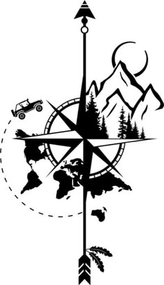 a compass with mountains and trees on it