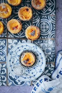 an overhead view of pastries on a blue and white plate