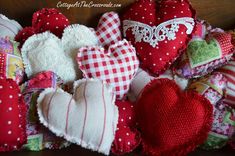 a pile of hearts sitting on top of a wooden table