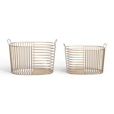 two metal wire baskets sitting next to each other on a white background, one is empty and the other has no handles