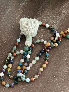 Let me make a mala for you. Bohemian Hand Wrapped Mala For Meditation, Handmade Multicolor Bohemian Mala, Bohemian Multicolor Handmade Mala, Handmade Multicolor Healing Mala, Handmade Multicolor Mala For Healing, Adjustable Multicolor Mala As Gift, Hand-strung Multicolor Mala For Meditation, Multicolor Hand-strung Mala For Meditation, Bohemian Hand Knotted Mala For Meditation