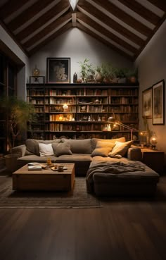 a living room filled with furniture and bookshelves