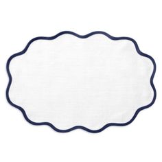 a white and blue place mat with an oval border