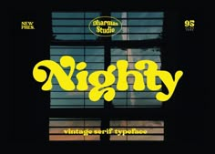 a window with the words nighty written in yellow on it's front and side