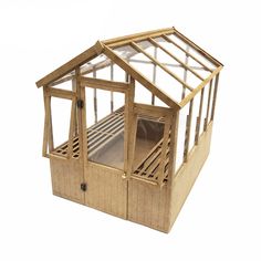 a wooden dollhouse with glass windows on the top floor and bottom part in wood