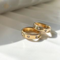 Gold Celestial Ring, Sun Rings, Water Proof Rings, 18K Gold Plated Jewelry, Celestial Simple Band, Gifts for Her, Celestial Jewelry, Gift. 💟 Material: Premium 316L Stainless Steel -18K Gold Plated. 💟 Gemstones: High-quality 3A Zircon Crystals 💟 Sizes: Available in US sizes 6, 7, 8 💟 Weight: Lightweight at just 3 grams 💟 Finish: Tarnish-free and hypoallergenic, ensuring long-lasting shine and comfort. 💫 Elegant Design: The classic gold finish paired with dazzling zircon crystals makes this ring a standout accessory. 💫 Durability: Made from high-quality stainless steel, it resists tarnishing and maintains its luster. 💫 Comfortable Fit: Lightweight and hypoallergenic, suitable for sensitive skin. 💫 Versatile: Perfect for everyday wear, whether at work, the gym, or a night out. Gold Jewelry With Halo Design For Promise, Gold Couple Rings With Diamond Accents For Promise, Gold Halo Design Jewelry For Promise, Gold Diamond Ring With Halo Design, Tarnish Resistant Round Diamond Wedding Ring, Tarnish Resistant Wedding Diamond Ring, Gold Celestial Rings For Anniversary, Celestial Style Gold Round Rings, Gold Celestial Diamond Ring