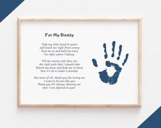 a blue handprint with the words for my daddy on it in front of a white wall