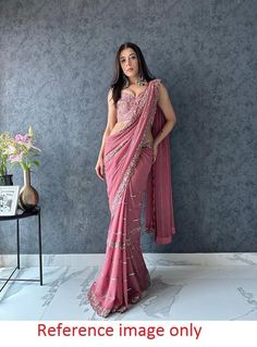 Georgette saree with blouse, Pink saree for women, wedding saree for function, sequence saree for evening wear, designer saree for function Saree Details:  Saree Color: Pink  Saree Fabric:  Faux Georgette Saree Work: Fancy  Thread Work  With  Sequence Work Saree Length:5.5 Meter Blouse Details : (UN-Stitched) Blouse Color: Matching. Blouse Length: 0.8meter Blouse Fabric:  Heavy Mono banglory Blouse Work:All Over Thread With  Sequence Work Blouse wear by model is just for modeling purpose only, a Party Wear Pre-draped Saree With Dupatta For Diwali, Party Wear Pre-draped Saree With Zari Work For Diwali, Pre-draped Saree For Reception And Diwali, Pre-draped Floor-length Saree With Unstitched Blouse, Party Wear Pre-draped Saree With Unstitched Blouse, Semi-stitched Party Wear Blouse With Sheer Dupatta, Semi-stitched Pre-draped Saree With Unstitched Blouse, Pre-draped Self Design Art Silk Saree For Reception, Diwali Party Wear Georgette Pre-draped Saree