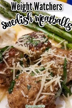 meatballs and asparagus on a white plate with text overlay that reads weight watchers swedish meatballs