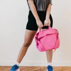 Meet your new BFF - the Carrie Catch All Shoulder Tote Bag! This trendy athleisure bag is perfect for gym days, running errands, or just looking stylish on the go. Comes in multiple colors including black, white, fuchsia, and lilac. Includes a removable strap, inner zipper pocket, and middle divider that also has a zipper pocket for all your essentials. Plus, a latch closure for extra security. The Carrie Catch All Shoulder Tote Bag is another addition to our 3 Sisters Collection! This collectio White Fuchsia, 2 Sisters, 3 Sisters, Complete Outfits, Athletic Outfits, Shoulder Tote Bag, Black Tote Bag, Shoulder Tote, Online Boutiques