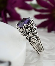 Elevate your style with this stunning handcrafted Amethyst Gemstone Double Queen Bee Detailed Women's Sterling Silver Cocktail Ring. Designed by expert filigree artisans, this ring features intricate details and a beautiful double queen bee design that is sure to make a statement. The ring is adorned with a 10mm double side faceted round cut Amethyst gemstone, which is the February birthstone, making it the perfect gift option for any February-born women. Perfect for special occasions such as Mo Filigree Rings, Playful Jewelry, Alexandrite Gemstone, Oyster Bay, Silver Cocktail, Gift For Your Girlfriend, Purple Band, Sky Blue Topaz, Filigree Design