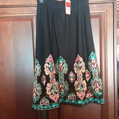 Black Embroidered Skirt, Nwt, Never Worn Flowy Skirt For Festive Spring Occasions, Traditional Black Bottoms For Spring, Embroidered Long Black Skirt, Embroidered Black Long Skirt, Multicolor Festive Skirt For Spring, Black Embroidered Long Skirt, Traditional Black Skirt For Summer, Embroidered Black Skirt For Summer, Black Embroidered Flowy Skirt