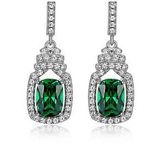 Add an elegant sparkle to the occasion by donning these lustrous earrings that each showcase a large green Diamonique simulated diamond. Green Diamond Earrings For Evening, Green Diamond Drop Earrings, Green Diamond Drop Earrings For Party, Green Cubic Zirconia Diamond Drop Earrings, Green Formal Earrings For May Birthstone, Green Earrings For Formal Events, May Birthstone, Formal Green Earrings For May Birthstone, Green May Birthstone Earrings For Formal Occasions, Classic Green Earrings For Party