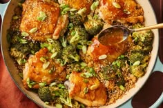 chicken, broccoli and rice in a skillet with a spoon