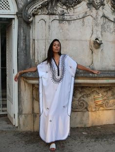 ooooooooooooº©ooooooooo This is a part of our new Boho Caftan Kaftan Series. This Moroccan Caftan Kaftan is so cozy, it's definately idea for wearing during the weekend, or when you just want to relax at home. Although this caftan is really cozy, because the style is so elegant, it could be worn for an exotic night in, or when you want to wow your friends at your home party. Or wear it outdoors with boots, and look super bohemian! **This caftan is also ideal for maternity wear. It's not only com White V-neck Kaftan For Festive Occasions, Festive White Tunic Dress, Festive White V-neck Kaftan, White Traditional Tunic For Festival, Festive White Kaftan, Traditional White Short Sleeve Tunic, Bohemian White Kaftan For Festivals, White Bohemian Kaftan For Festivals, White Beachwear Dress For Holidays