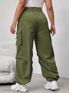 Embrace the utility trend with our Flap Side Pocket Drawstring Waist Loose Cargo Pants. These long-length pants combine practicality and style effortlessly. The loose fit and natural waistline provide all-day comfort, while the button details and flap side pockets add a touch of rugged charm. Made from durable woven fabric, these cargo pants are built to withstand daily wear and tear. Specifications: Details: Button, Pocket Waist Line: Natural Fit Type: Loose Type: Cargo Pants Length: Long Fabri Baggy Bottoms With Elastic Waistband For Outdoor Activities, High Waist Khaki Pants With Drawstring, Khaki High Waist Drawstring Pants, Khaki High-waist Drawstring Pants, Green Utility Pants With Drawstring, Wide Leg Pants With Elastic Waistband For Outdoor, Baggy Green Bottoms With Drawstring, Baggy Ankle-length Cargo Pants For Outdoor, Wide Leg Bottoms For Spring Outdoor Activities