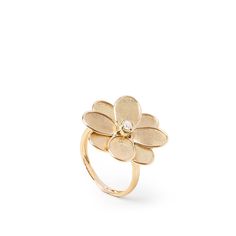 This Marco Bicego ring from the Petali collection features a flower accented by a diamond in the center of the 18kt yellow gold piece of jewelry. Luxury Flower Ring With Single Cut Diamonds, Luxury Flower Shaped Rings With Single Cut Diamonds, Luxury Flower-shaped Ring For Formal Occasions, Luxury Yellow Gold Flower Ring With Brilliant Cut, Luxury Flower-shaped Rings With Center Stone, Yellow Gold Diamond Flower Ring, Luxury Flower Ring For Formal Occasions, Elegant Flower Ring With Rose Cut Diamonds, Elegant Flower Shaped Ring With Rose Cut Diamonds