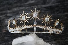 a tiara on top of a rock with crystals