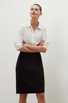 The Cobble Hill Skirt—Origami Suiting - Black | M.M.LaFleur Pleated Midi Pencil Skirt For Workwear, Classic Flowy Skirt For Work, Versatile Flowy Skirt For Work, Classic Flowy Mini Skirt For Work, Relaxed Lined Skirt For Workwear, Modern Workwear Mini Pencil Skirt, Modern Stretch Skirt For Work, Classic Flowy Skirt For Office, Modern Pencil Mini Skirt For Workwear